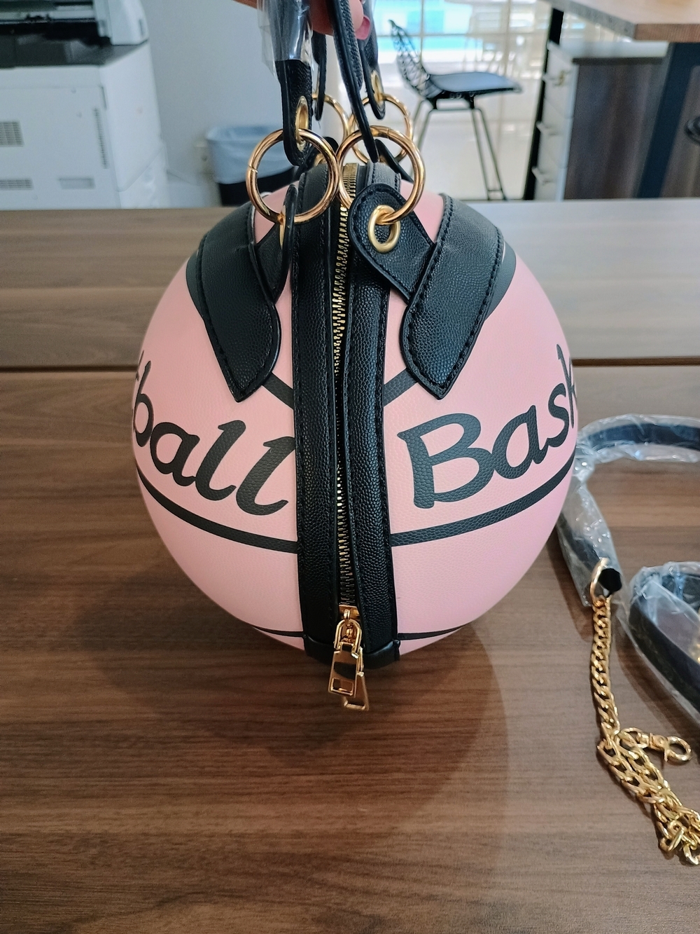 Pink Basketball-Style Round Crossbody Bag with Black Trim - Picture 2 of 6